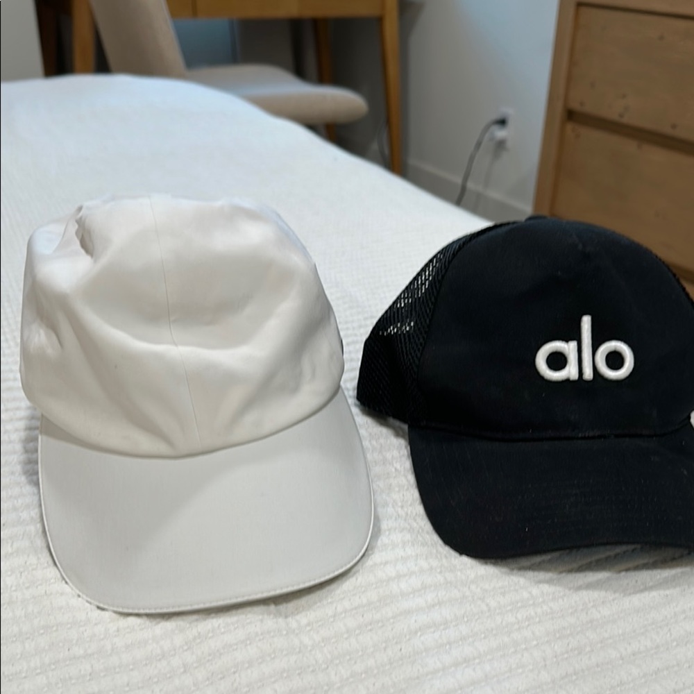 alo adjustable trucker hat, and a Lululemon adjustable hat